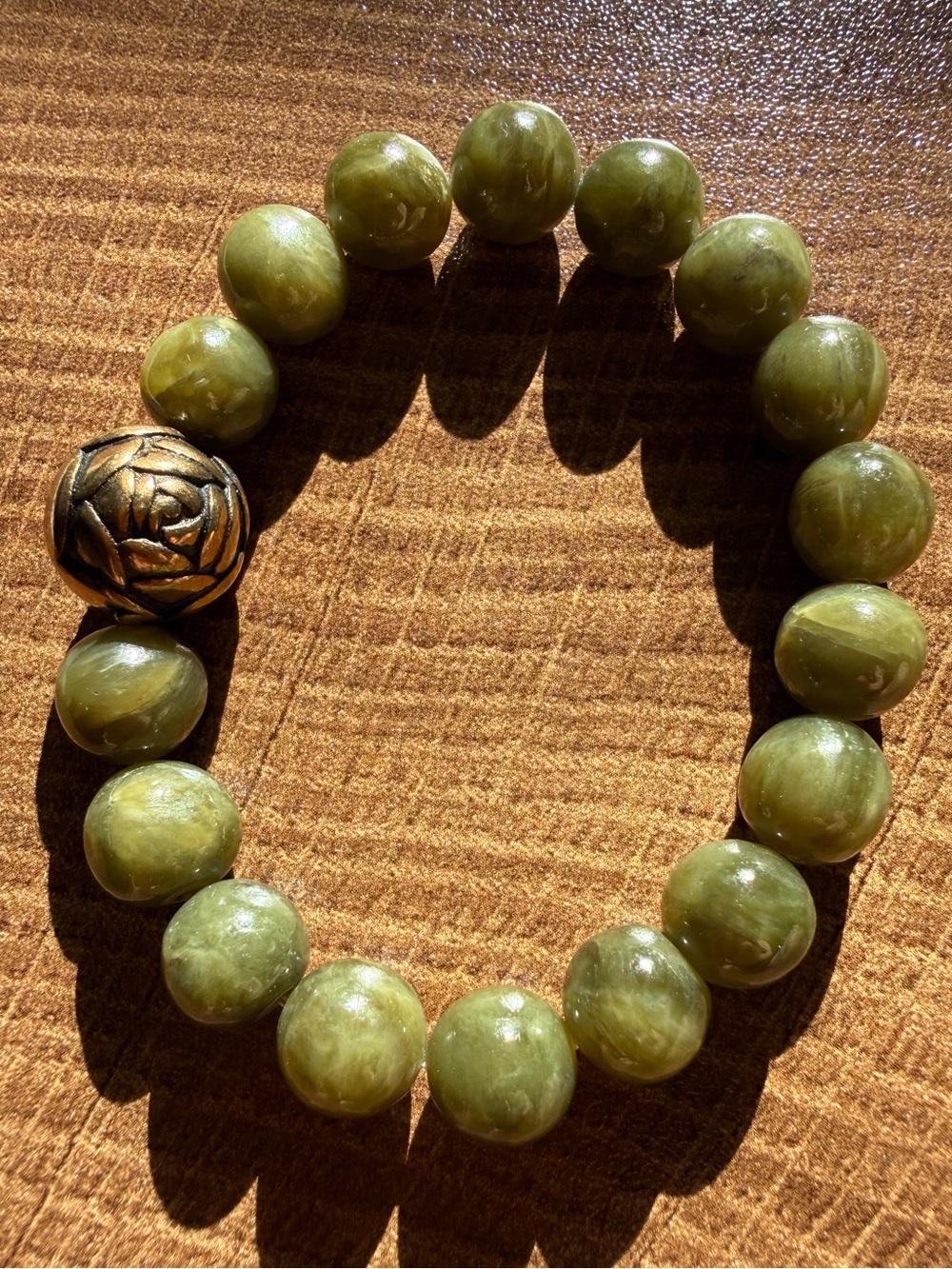 10mm Serpentine Crystal Beaded Stretch Bracelet with Gold-Tone Rose Accent
